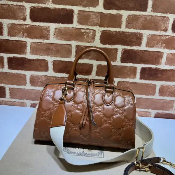 GUCCI GG matelassé leather top handle bag 0123