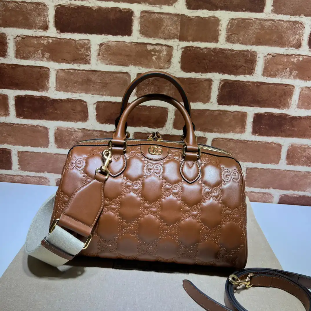 GUCCI GG matelassé leather top handle bag 0123